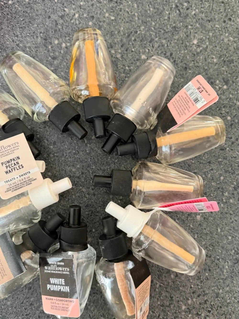 12 Empty wallflower refill bottles